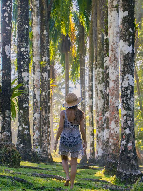 Woman walking through jungle at SCP