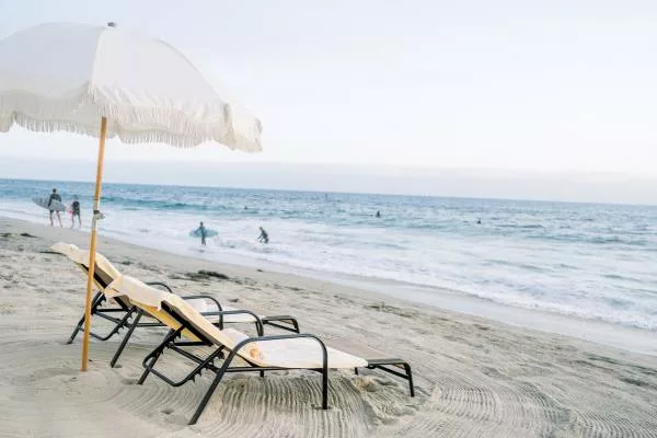 Beach chairs in front of Laguna Surf Lodge