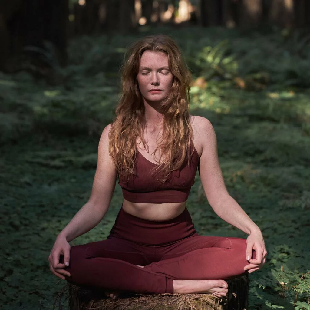 Woman meditating at SCP Mendocino Inn and Farm