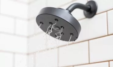 Low flow shower head at SCP Sustainable Hotels